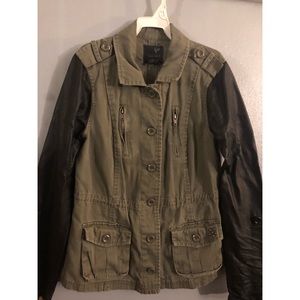 Army green/leather jacket.